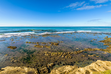 Beautiful landscape at Bushy Beach scenic reserve a popular spot for penguin and seal watching. Oamaru, Otago region, New Zealand.