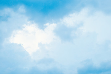 Obraz premium Sky-blue light fluffy clouds in sky with copy space. For background and wallpaper