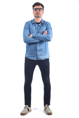 full portrait of a man crossed amrs and serious on white background