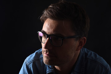 portrait of a man on black