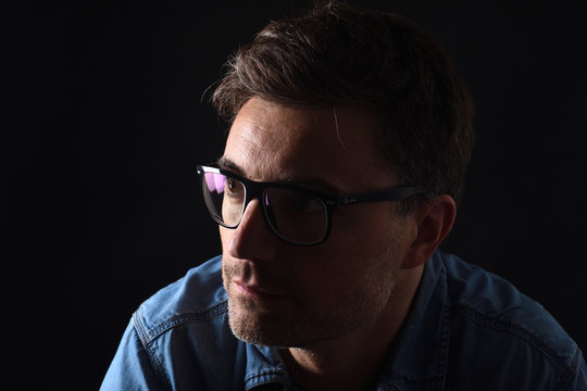 portrait of a man on black