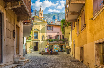 Obraz premium Narrow street in the little medieval village of Malcesine. It is one of the most characteristic towns of Lake Garda in Verona Province, italy