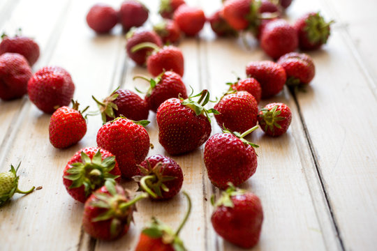 Close up of strawberries on wooden table