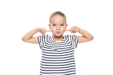 Cute young girl making special exercises at speech therapy office. Child speech therapy concept on white background. Speech impediment corrective exercises.