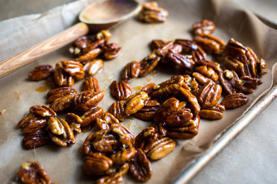 Close up of pecan nuts on baking tray