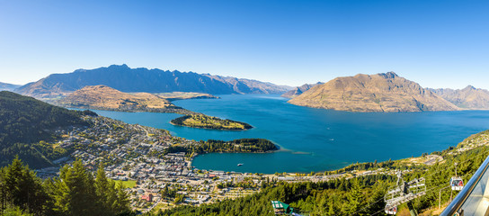 Beautiful panoramic aerial view of Ben Lomond Lake Scenic reserve with mountains in the background,...
