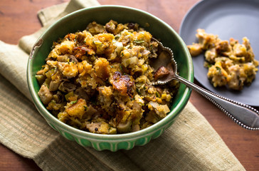 Close up of mushroom and bacon  stuffing served in bowl