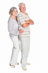 Portrait of beautiful senior couple posing on white background