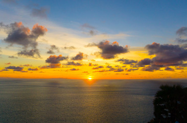 Fototapeta na wymiar Beautiful sunset and cloud,paradise tropical island beach, sunrise shot,evening at Promthep Cape Phuket Thailand,silhouette landscape
