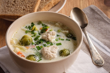 Creamy soup with vegetables and turkey meatballs.