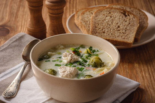 Creamy soup with vegetables and turkey meatballs.
