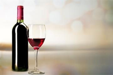 Red wine glass  on  background