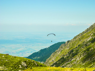 Parasailing in the mountains.