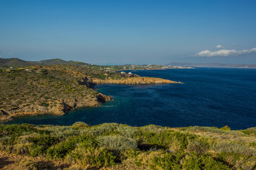 beautiful summer nature scenery landscape of sea bay with shore mountain line and vivid blue sky