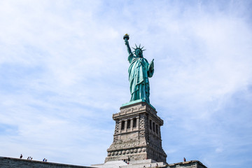 majestic Statue of liberty against a blue sky. New York, USA