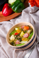 delicious autumnal vegetable soup with sausage and bacon