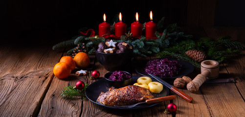 classic and crispy roasted duck with cabbage and dumplings