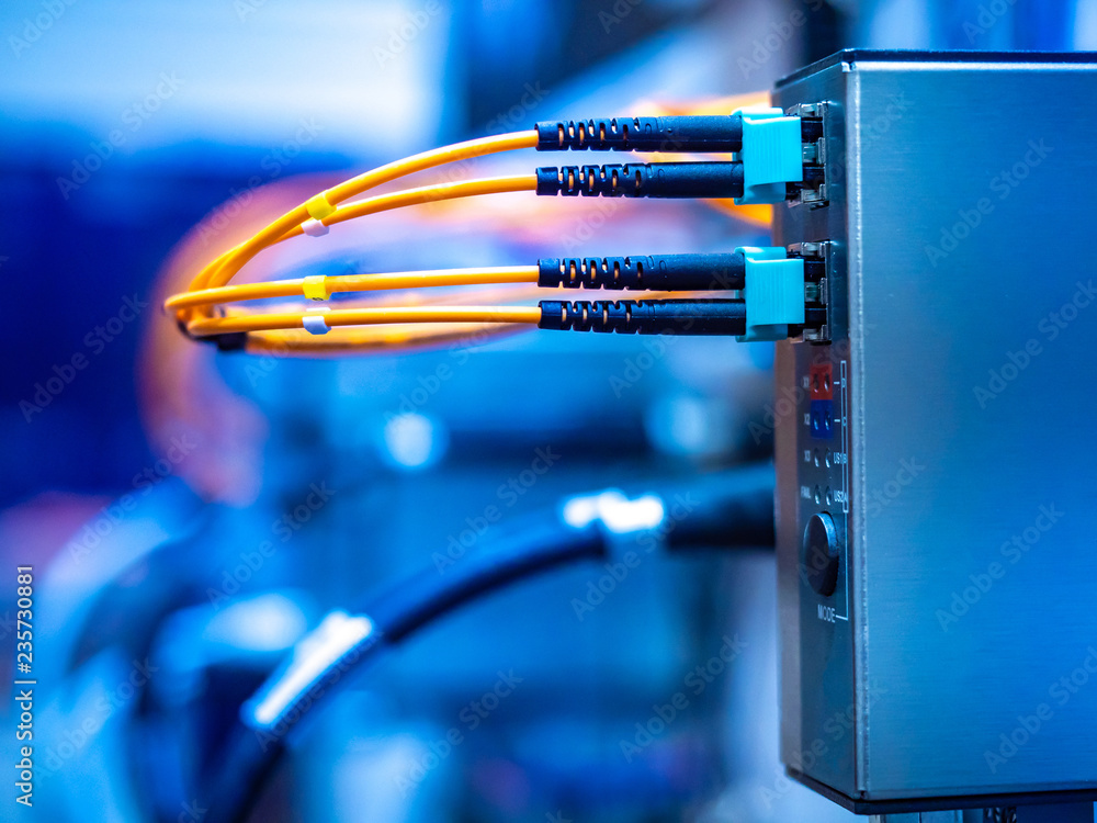 Poster internet connection. router. wire connection. network cables connected in a technology data center.