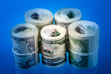 Dollars twisted rubber band. Money. Bills. Dollars. Cash. Illegal income.