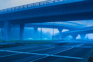Freeway in the fog. Fog. Highway. Empty road.