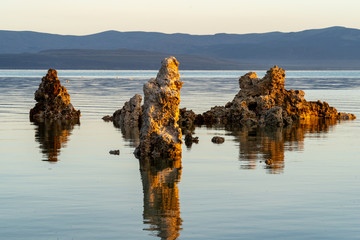 Isolated tufa towers during sunrise at California Mono Lake in the Eastern Sierra Nevada mountains