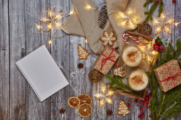 Fototapeta na wymiar Christmas ornaments, gingerbread cookies and coffee