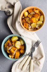 Salad of baked vegetables of pumpkins, potato, onion