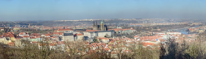 Naklejka na ściany i meble Panorama of Prague in sunlight of winter afternoon, Czech Republic.