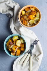 Salad of baked vegetables of pumpkins, potato, onion
