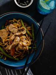 Asian noodles with pork in teriyaki sauce, with green beans, carrots and shiitake mushrooms.