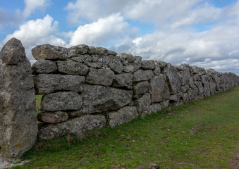 Substantial granite dry stone wall in rural setting, Dartmoor National Park, Devon