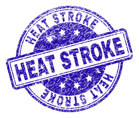 HEAT STROKE stamp seal watermark with grunge texture. Designed with rounded rectangles and circles. Blue vector rubber print of HEAT STROKE title with unclean texture.