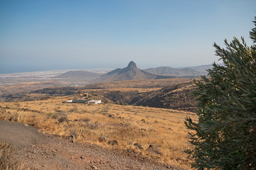 Country panorama with small peak.