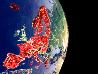Satellite view of Schengen Area members at night with visible bright city lights. Extremely fine detail of the plastic planet surface.
