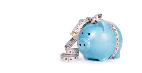 Piggy bank and measuring tape