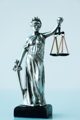 Lady Justice statue in law firm office
