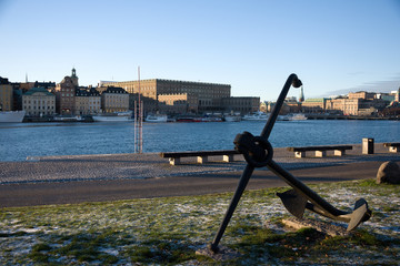 An Anchor on a pier in Stockholm with the old town in the background