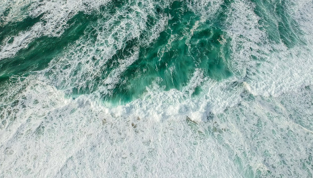 Aerial view of stormy ocean with waves. Drone photo 