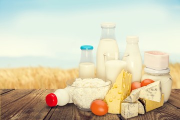 Dairy products collection on green light background