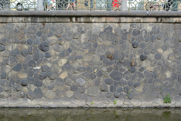 The old wall of stone blocks