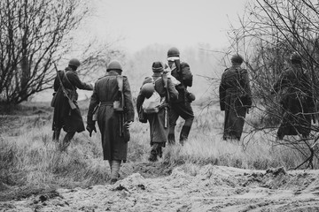 The soldiers of the red army in their overcoats go to the positi