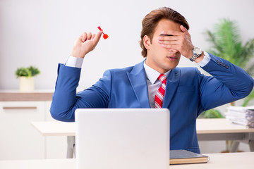 Businessman throwing dart in business concept