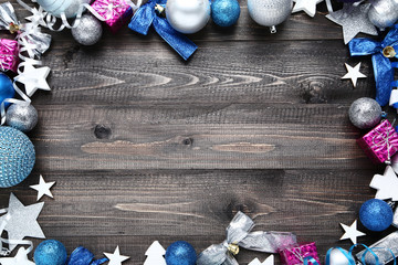 Colorful christmas decorations on wooden table