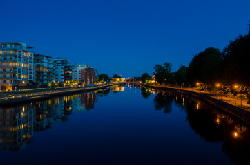Fototapeta na wymiar night view of the bridge and river in Halmstad