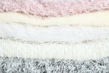 Background of folded sweaters