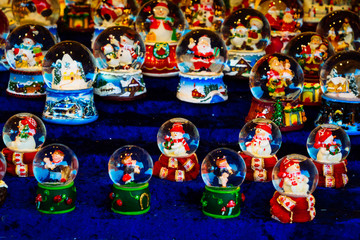 Christmas market kiosk details - snawball with snowman, santa claus and houses