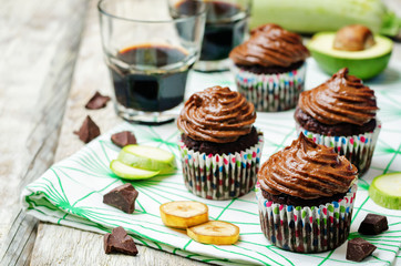 Chocolate zucchini banana cupcakes with chocolate avocado banana peanut butter cream frosting