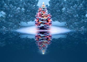 This beautifully decorated Christmas Tree magically reflections in the small frozen lake is is surrounded by snow covered pine trees. - 235764031