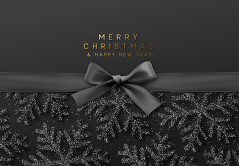 Christmas background with shining black snowflakes and a black ribbon with bow.