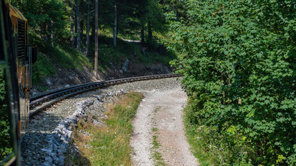 Unique rack railway to the top of Schneeberg mountain in the Austrian Alps. View from the train.